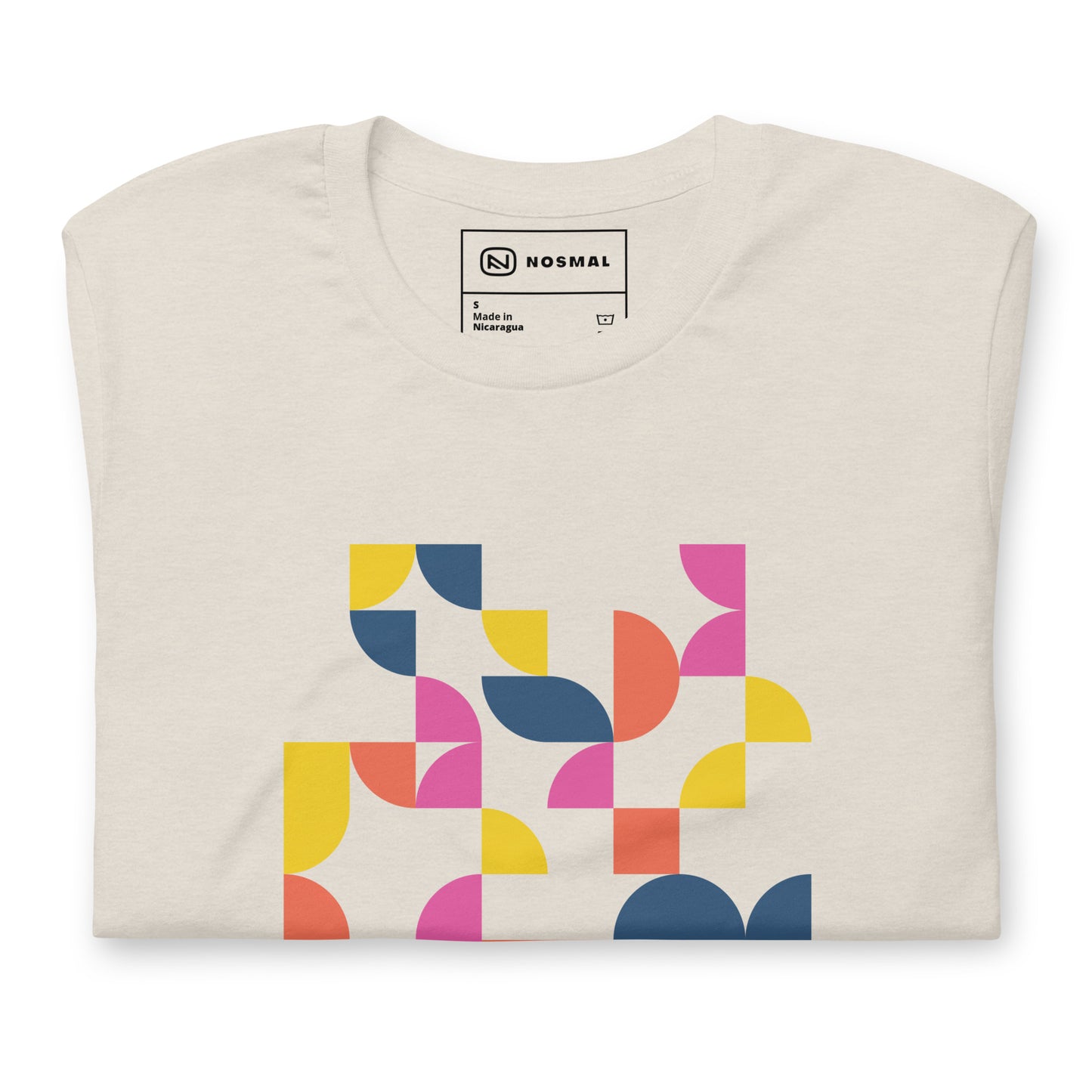 Top down view of geometria I sunrise design on heather dust unisex t-shirt.