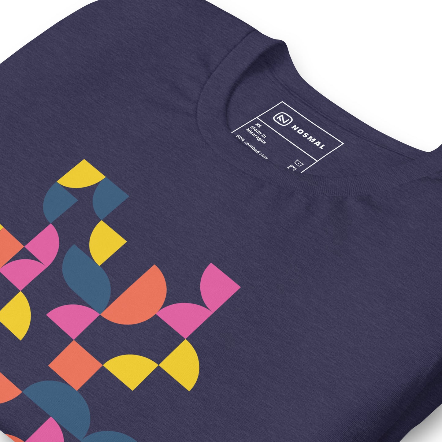 Angled close up shot of geometria I sunrise design on heather midnight navy unisex t-shirt.