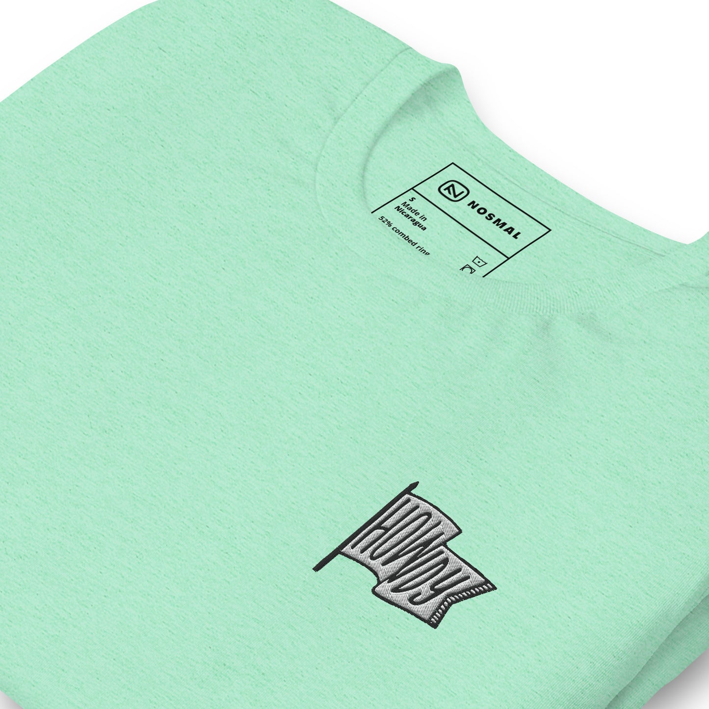 Angled close up howdy embroidered design on heather mint unisex t-shirt.