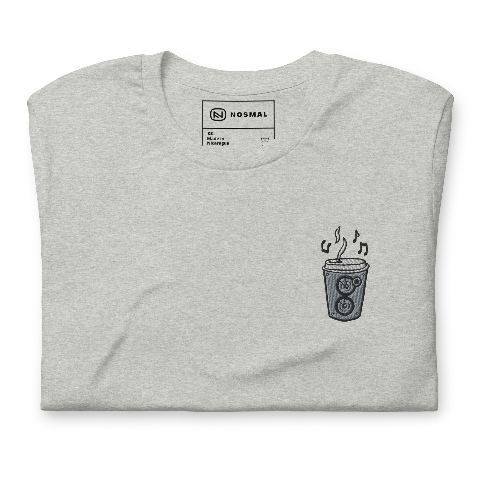 Top down view of the coffee is my jam embroidered design on heather athletic grey unisex t-shirt.
