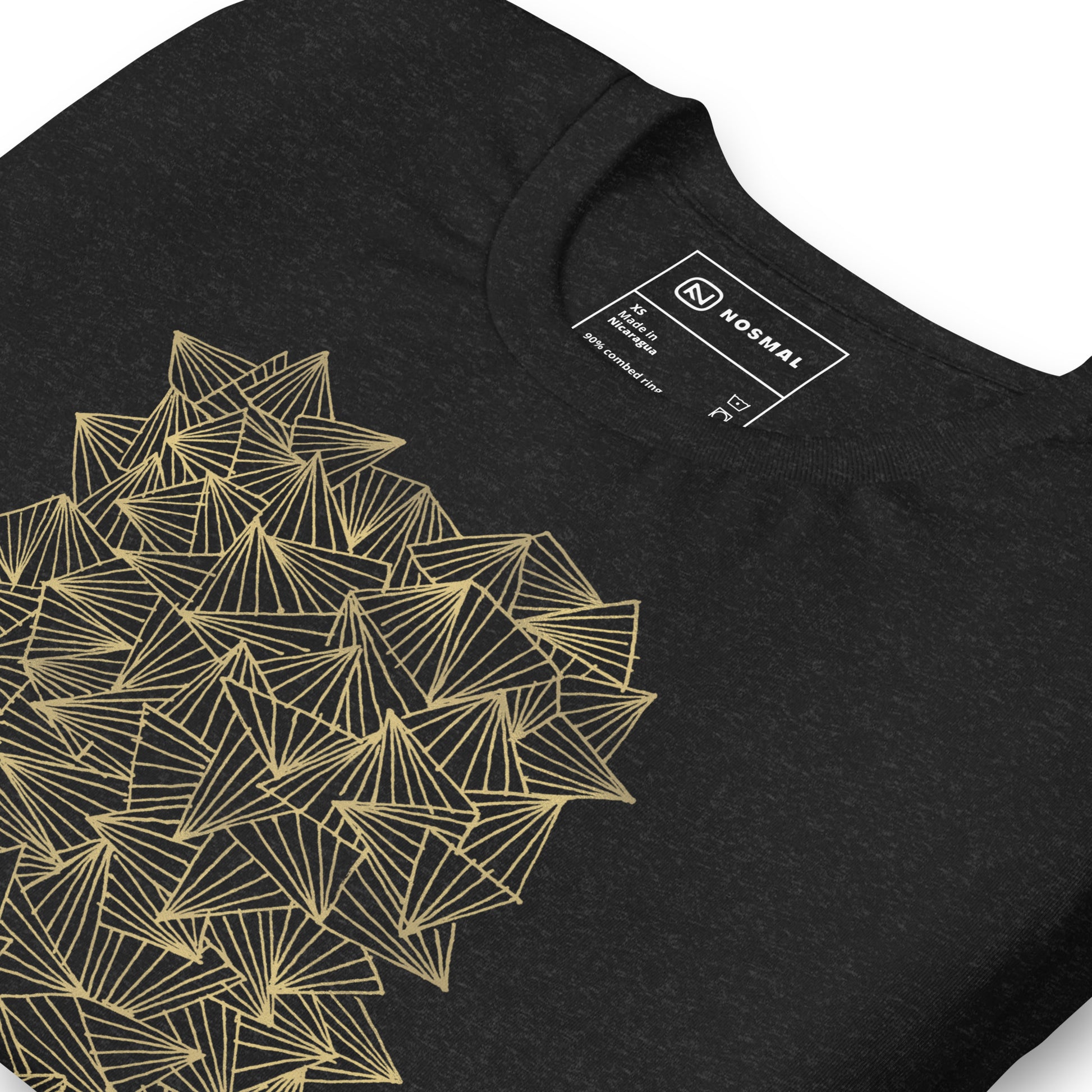Angled close up shot of gaggle of triangles gold design on heather black unisex t-shirt.