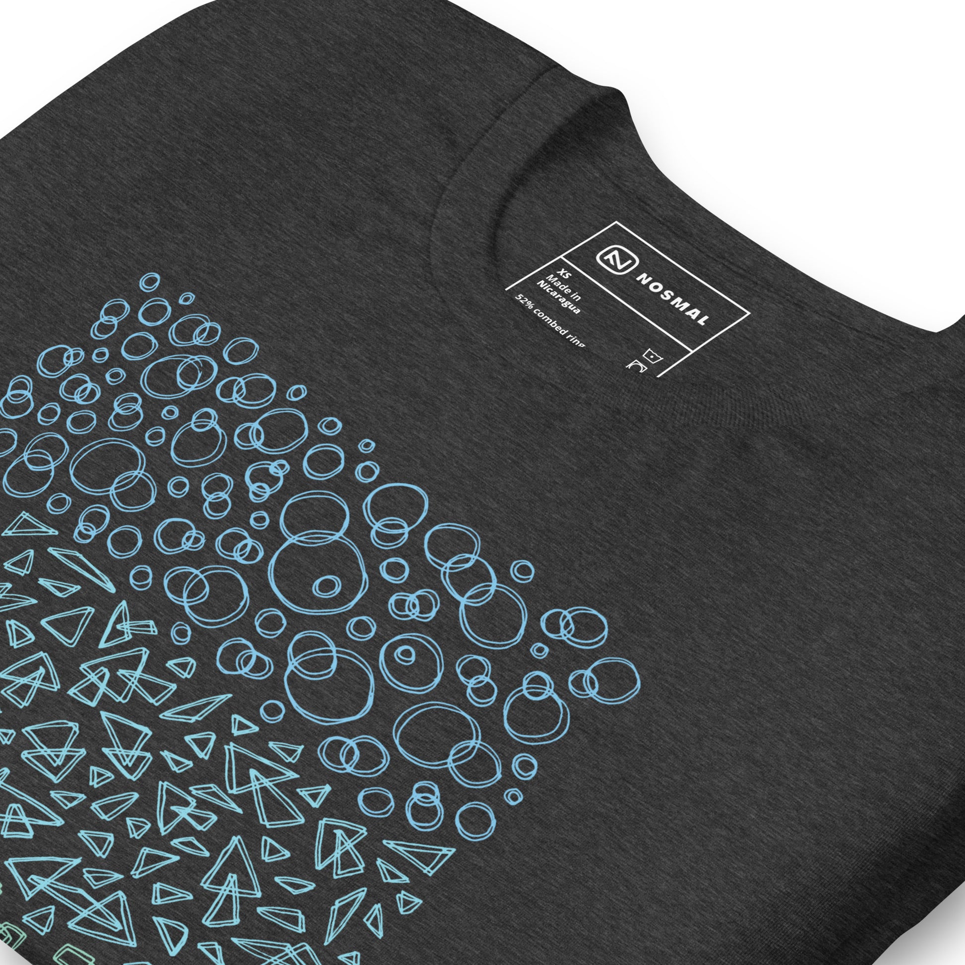Angled close up shot of geometrinity azure design on heather dark grey unisex t-shirt.