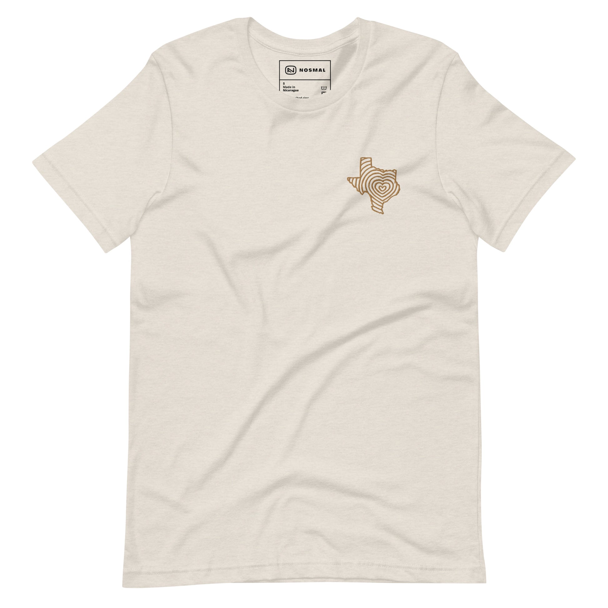 Straight on view of heartbeat of texas gold embroidered design on heather dust unisex t-shirt.