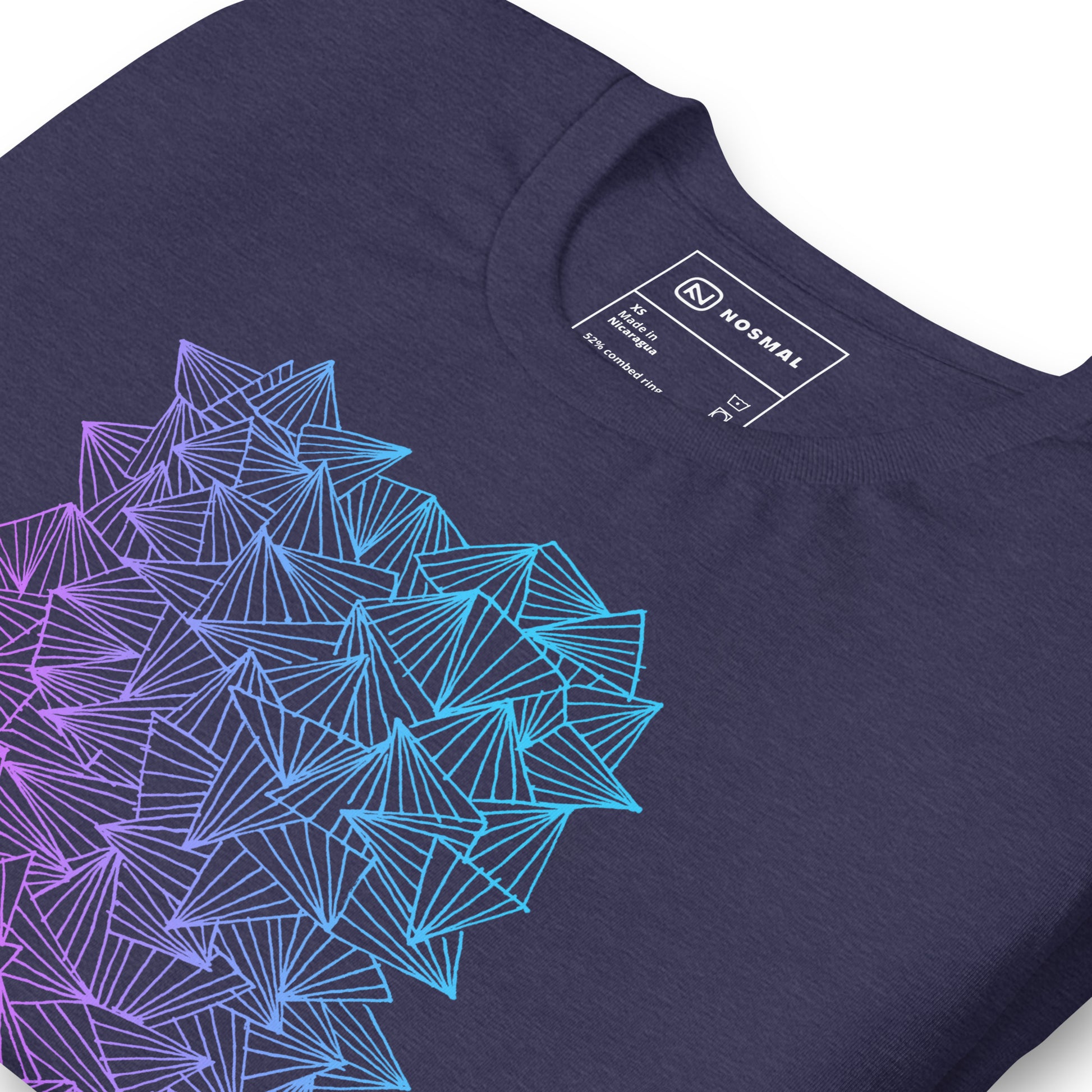 Angled close up shot of gaggle of triangles gradient design on heather midnight navy unisex t-shirt.