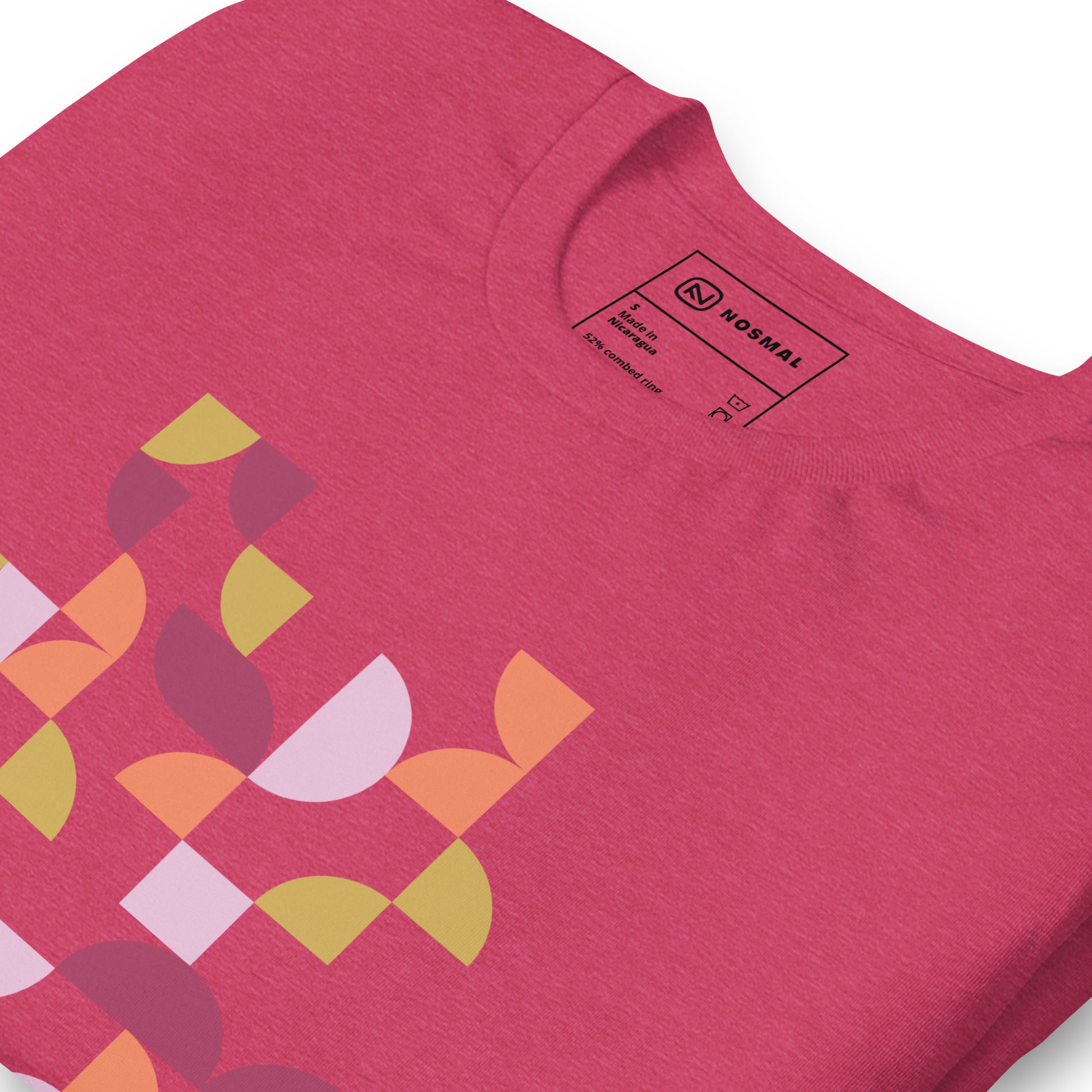 Angled close up shot of geometria I sunset design on heather raspberry unisex t-shirt.